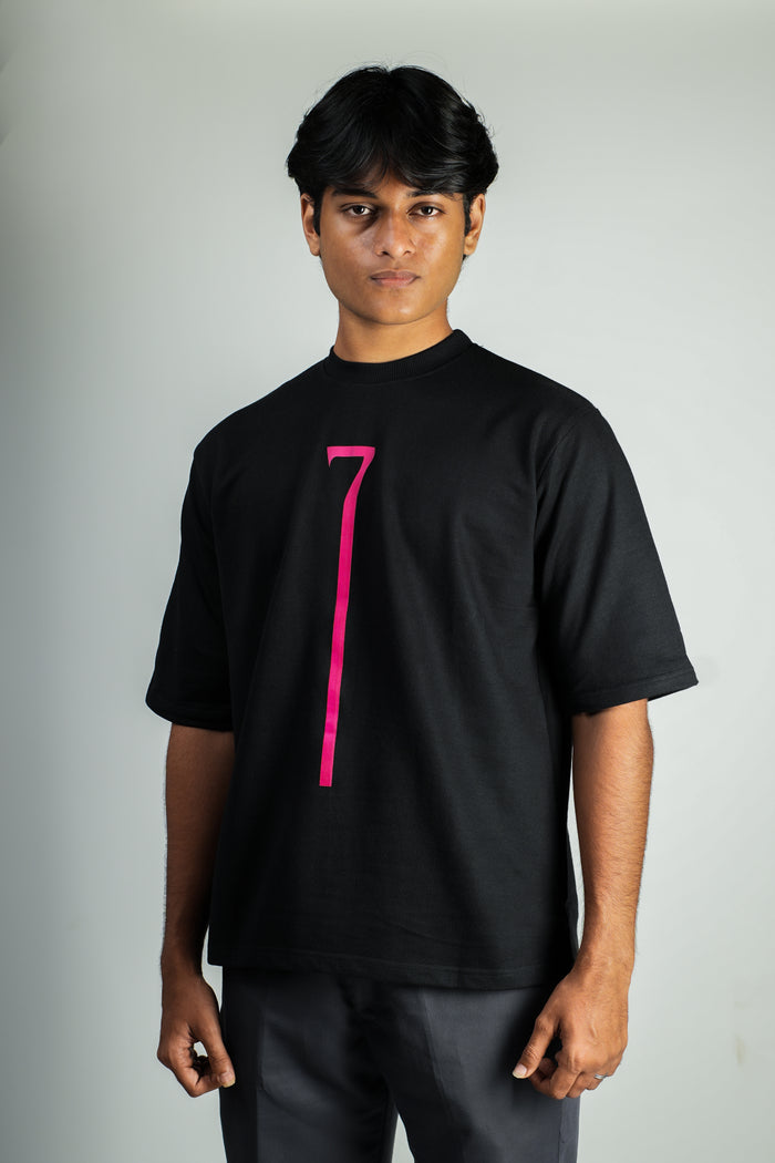 Model wearing ERMN oversized t-shirt for fit reference